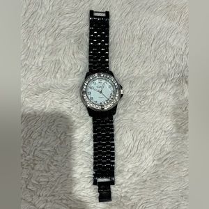 Black watch with diamonds around